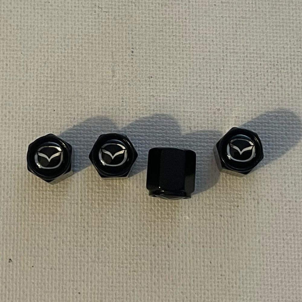Mazda valve Stem caps in Black set of 4 NWT